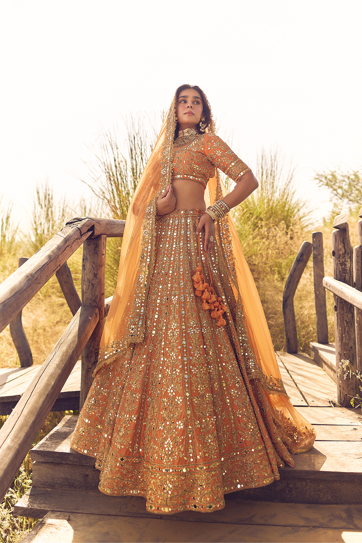 RUST ORANGE MIRROR, DORI AND ZARDOZI LEHENGA