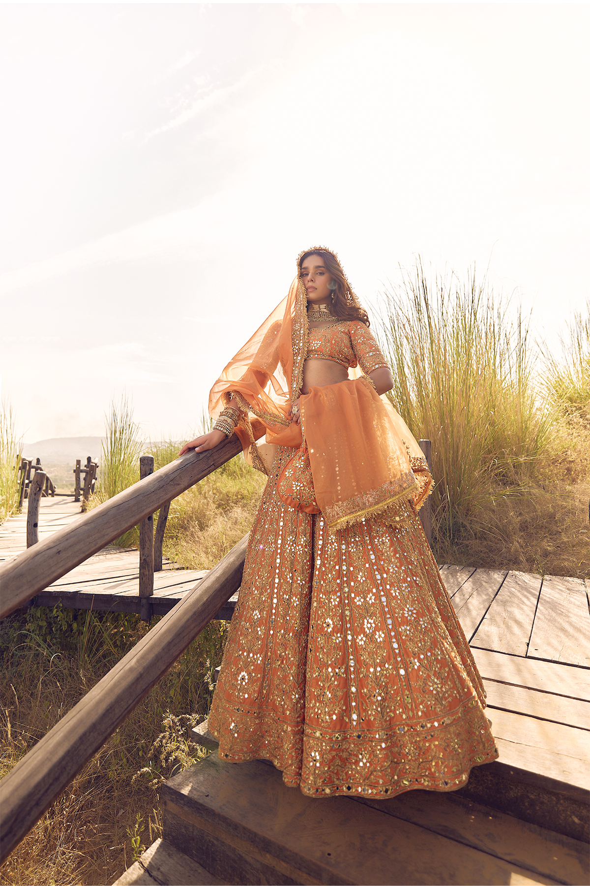 RUST ORANGE MIRROR, DORI AND ZARDOZI LEHENGA