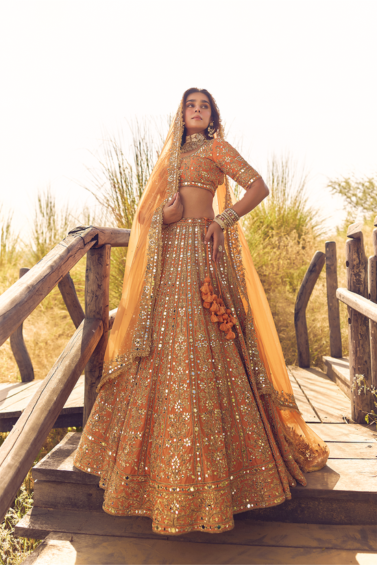 RUST ORANGE MIRROR, DORI AND ZARDOZI LEHENGA