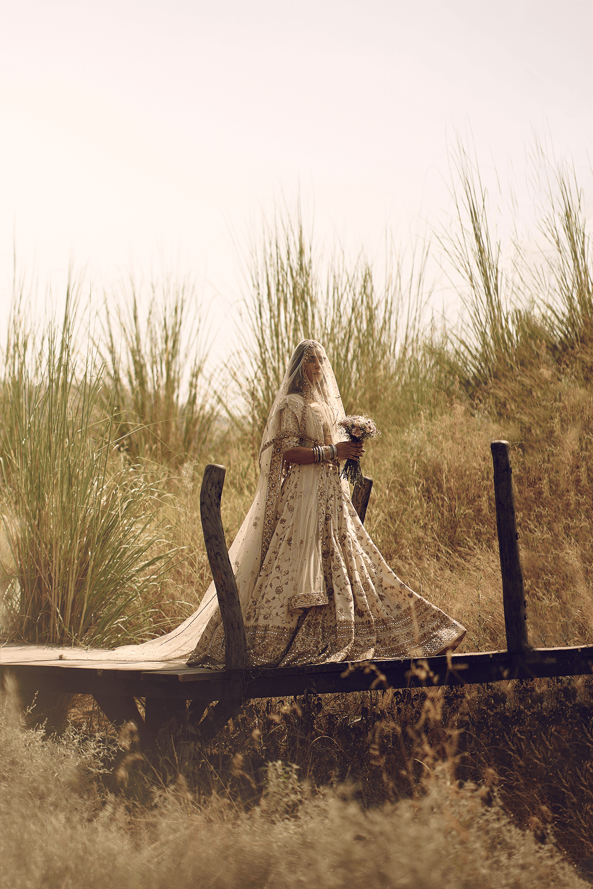 GOLD DABKA ZARDOZI JAAL BRIDAL LEHENGA WITH HEAVY BORDER